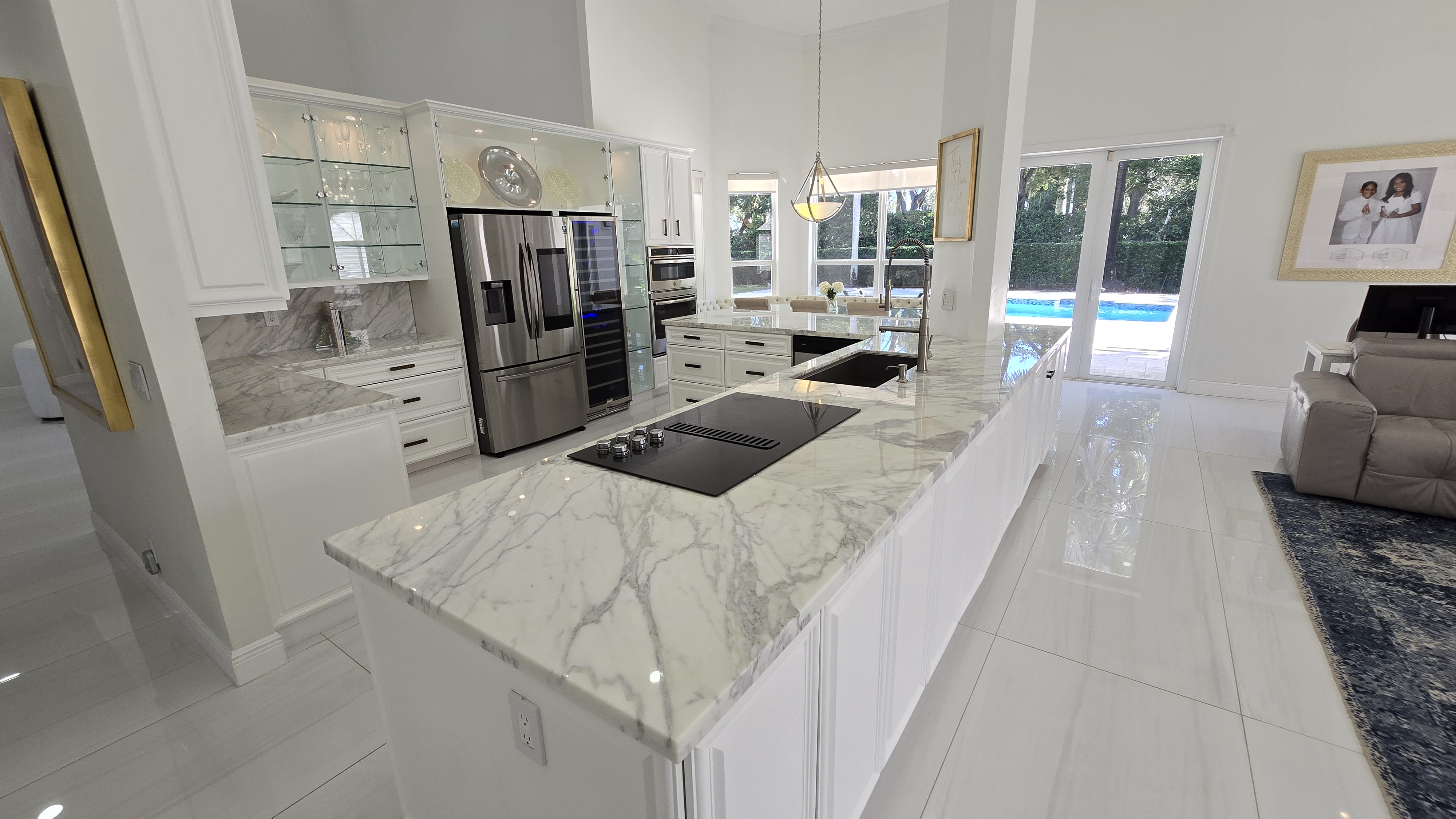 Move to Weston FL and save on taxes — luxury marble kitchen island in estate home for sale
