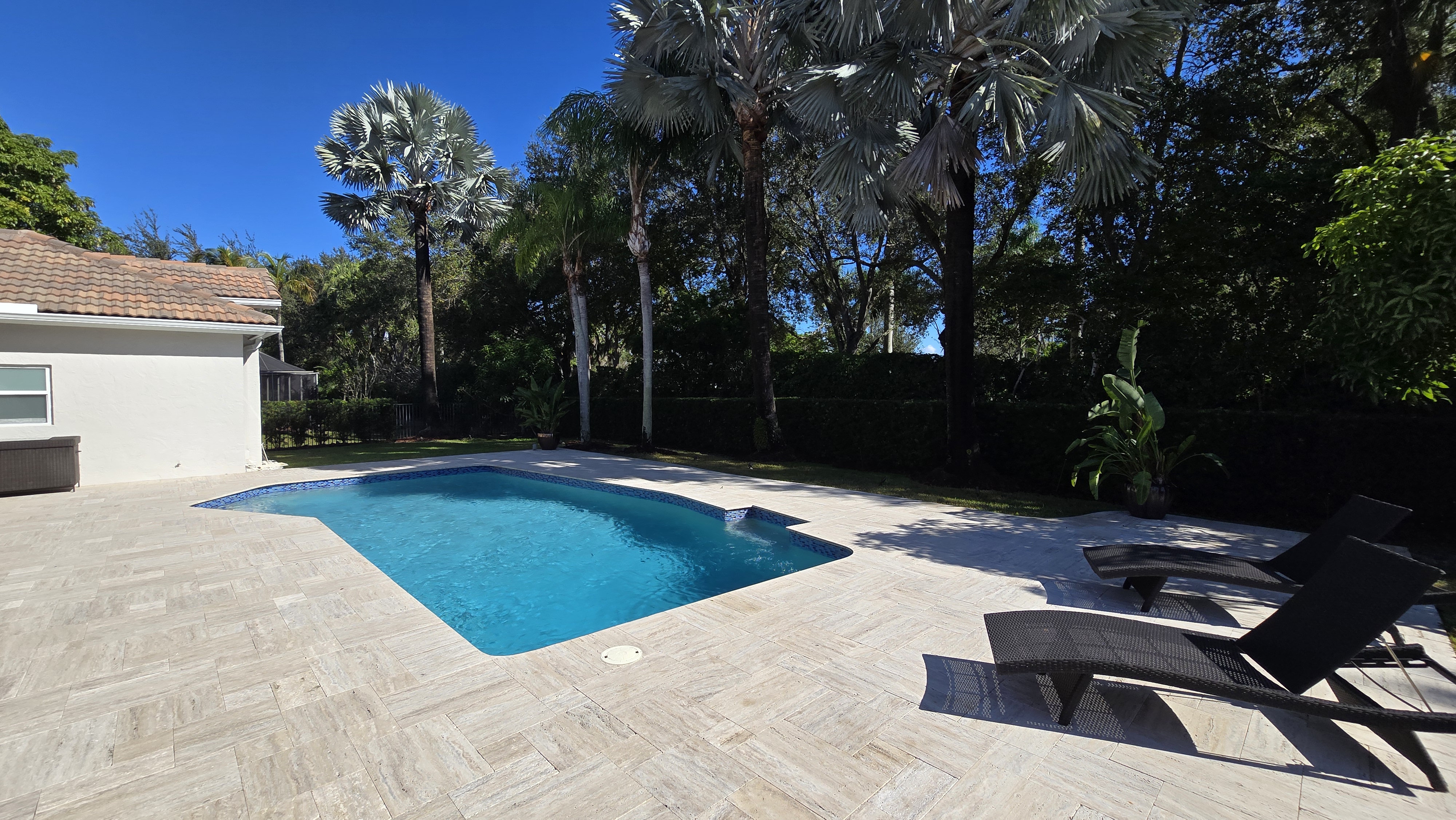 Move to Weston Florida — resort-style pool and travertine patio, year-round outdoor living with zero state income tax