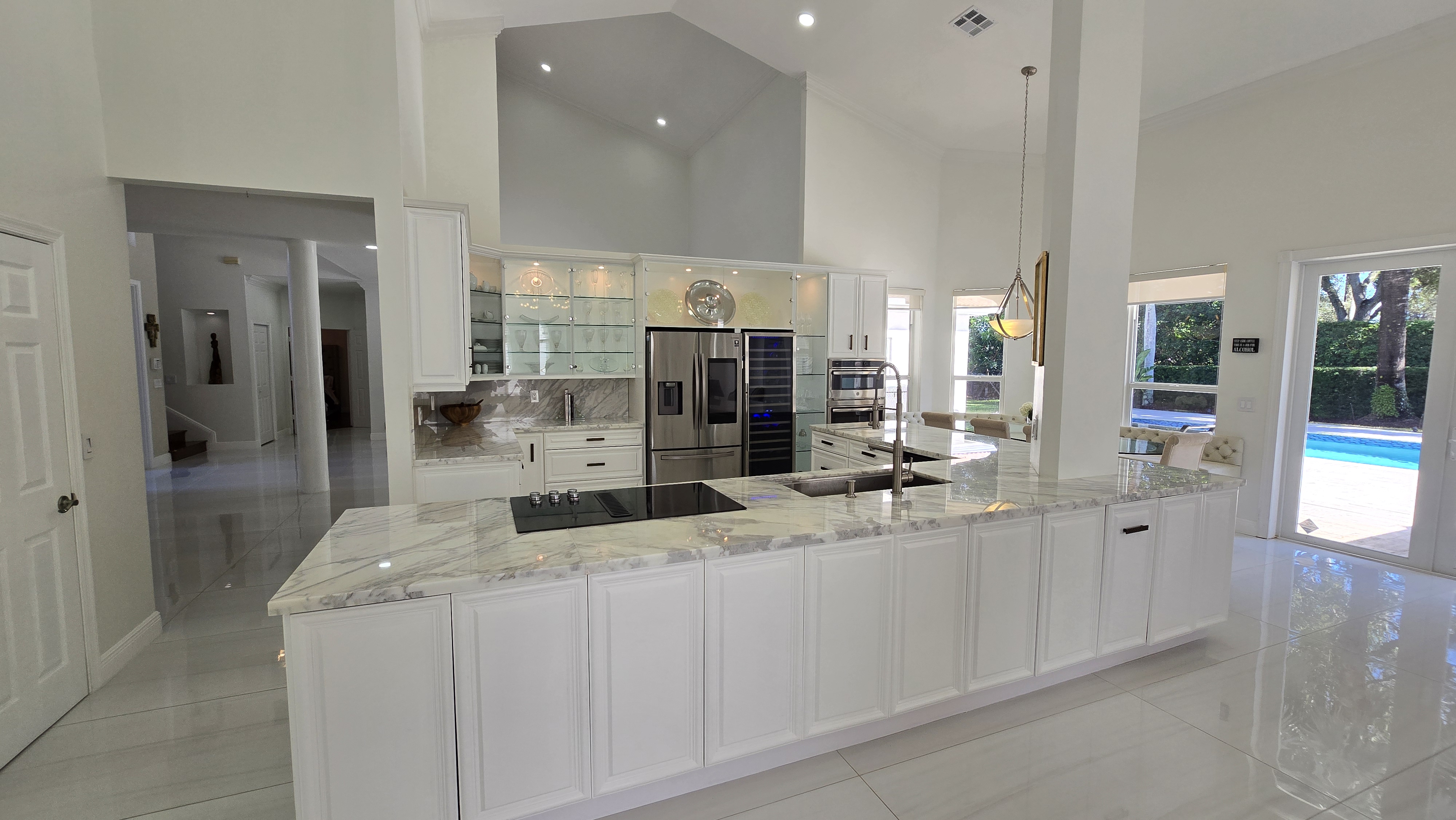 Weston Florida home for sale — Italian Carrara marble chef's kitchen with custom cabinetry and stainless appliances